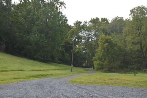Gravel farm lane running between fields at Stoke, southwest of Aldie in Loudoun County, Virginia