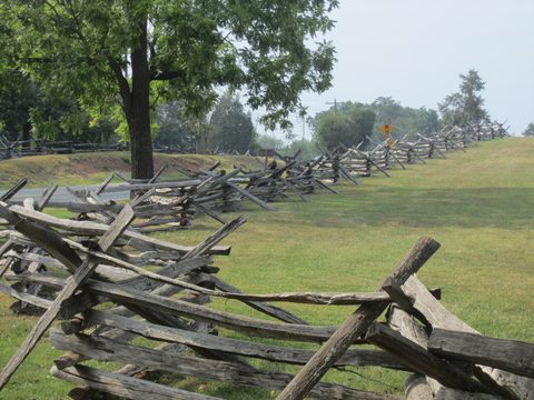 Split-rail worm fence along open grassland at Manassas National Battlefield Park, Virginia